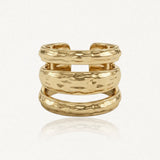 Bague ajustable en acier inoxydable doré, texturée martelée, à trois bandes.