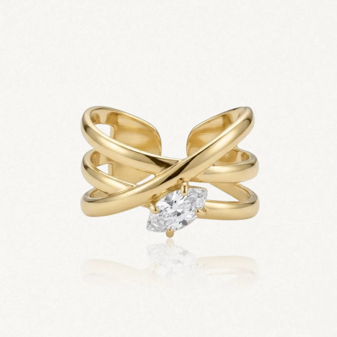 Bague multirang entrelacée en acier inoxydable doré, ornée d'un zirconium ovale.