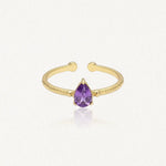 Bague Leandra ajustable en acier inoxydable doré avec une pierre violette en forme de goutte
