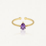 Bague Leandra ajustable en acier inoxydable doré avec une pierre violette en forme de goutte