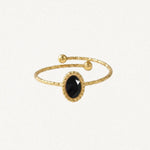 Bague ajustable en acier inoxydable doré martelé, avec une pierre naturelle noire ovale facettée et deux billes aux