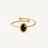 Bague ajustable en acier inoxydable doré martelé, avec une pierre naturelle noire ovale facettée et deux billes aux