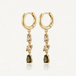 Boucles d'oreilles créoles pendantes en acier inoxydable doré, avec une cascade de zircons champagne et marron.