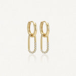 Boucles d'oreilles Kylie en acier inoxydable doré composées d'un anneau et d'un pendentif ovale orné de zircons
