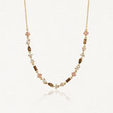 Collier Blair en acier inoxydable doré orné de petits strass colorés de formes variées sur une fine chaîne