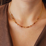 Collier Blair en acier inoxydable doré orné de strass en zirconium aux teintes brunes et transparentes