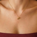 Collier chaîne en acier inoxydable doré, avec un pendentif teckel.