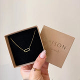 Collier Kylie en acier inoxydable doré avec un pendentif ovale orné de strass en zirconium dans un coffret cadeau