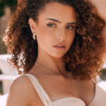 Colliers superposés en acier inoxydable doré: ras de cou perlé, chaîne fine étoile, pendentif minimaliste. Femme.