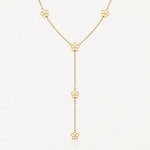 Collier en acier inoxydable doré, chaîne fine avec cinq motifs fleurs évidées disposés en forme de Y.
